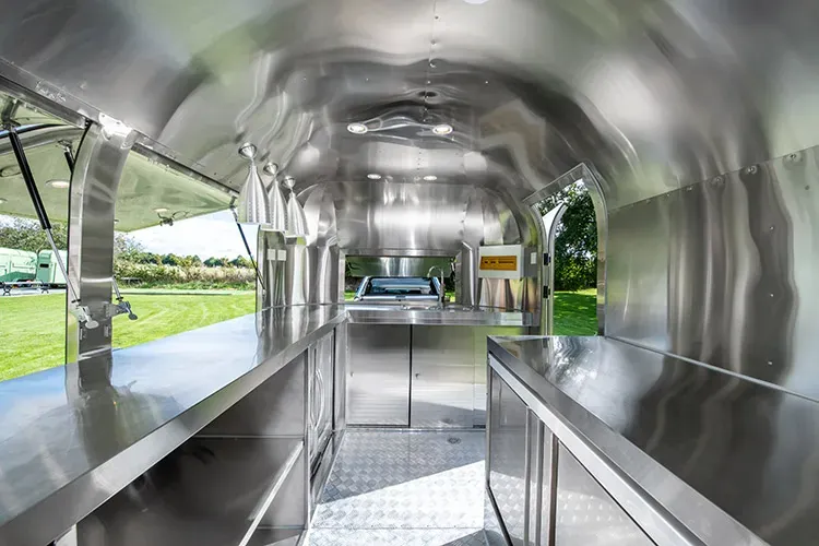 Polished stainless steel interior of the PremierPlus catering trailer